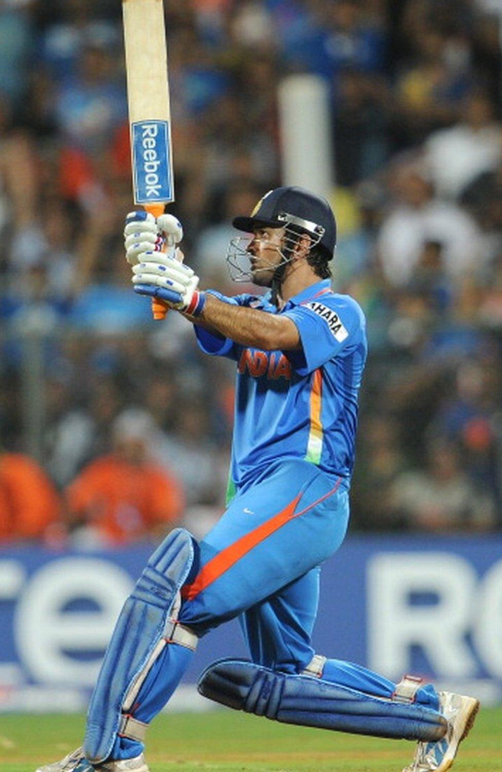 Indian captain Mahendra Singh Dhoni hits a six to give India victory over Sri Lanka in the ICC Cricket World Cup 2011 final played at The Wankhede Stadium in Mumbai on April 2, 2011. India beat Sri Lanka by six wickets. AFP PHOTO/William WEST (Photo credit should read WILLIAM WEST/AFP via Getty Images)