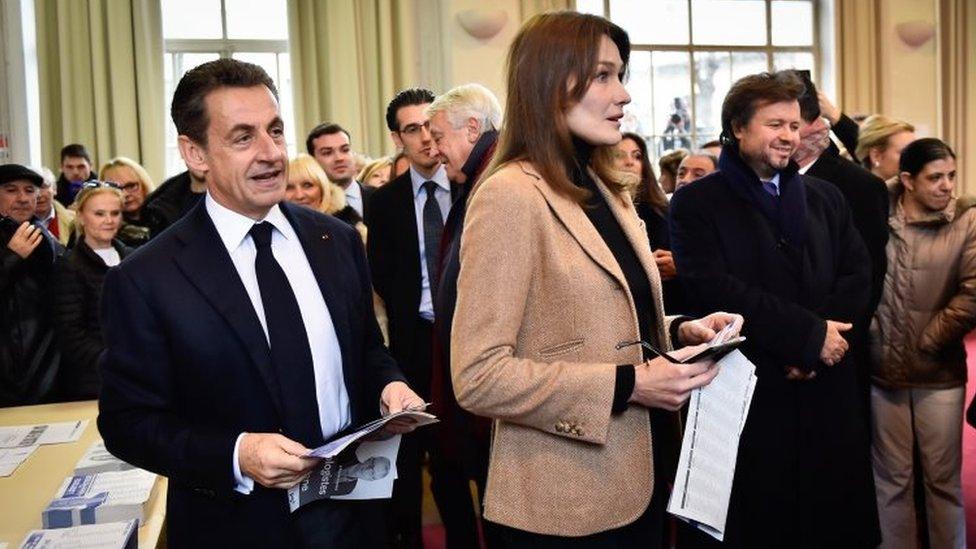 Nicolas Sarkozy and his wife Carla Bruni-Sarkozy vote in Paris. Photo: 13 December 2015