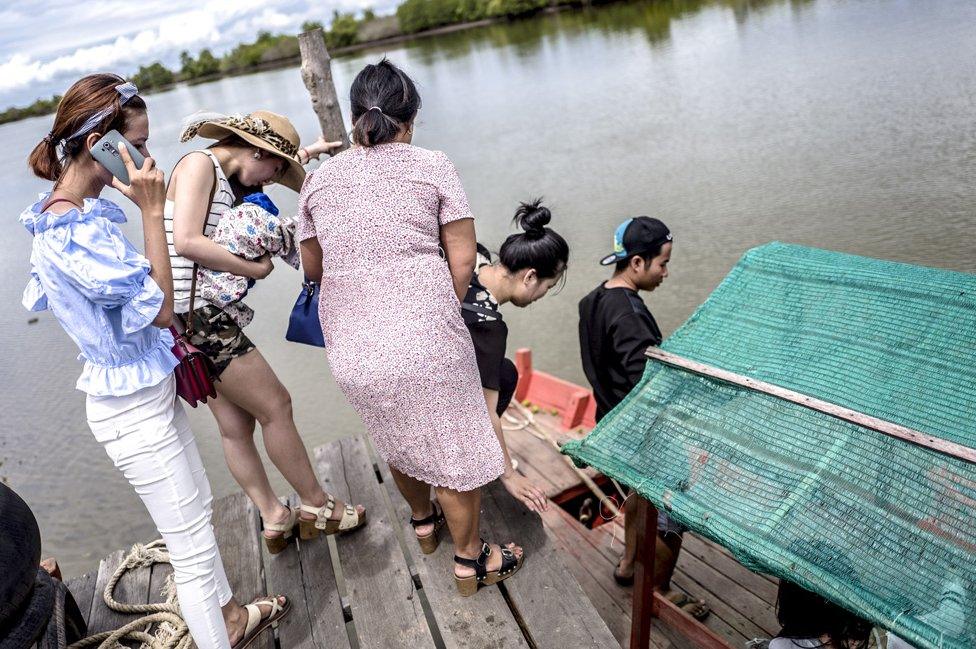 Cambodian students set out on a trip to see the mangroves