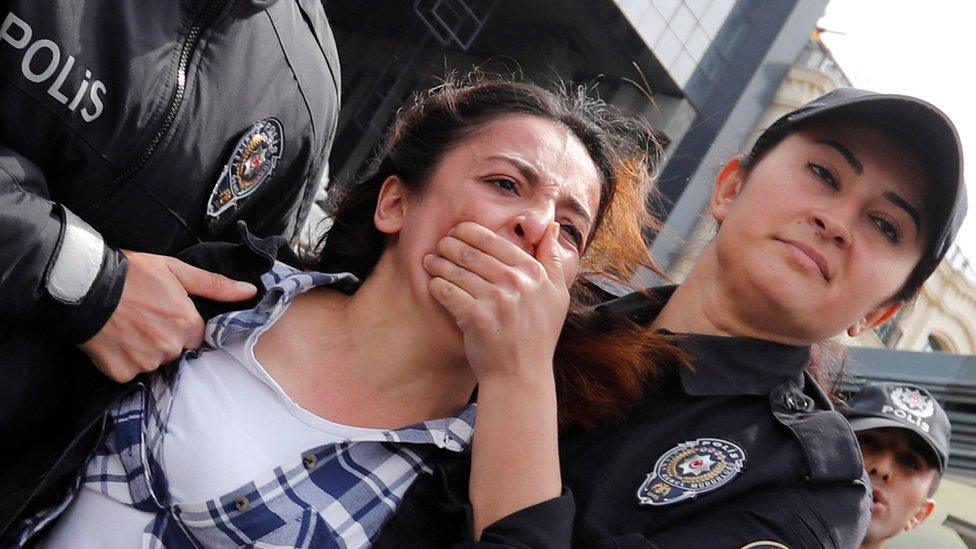 Police detain a protester after marching on Taksim Square to celebrate May Day in Istanbul, Turkey May 1, 2019