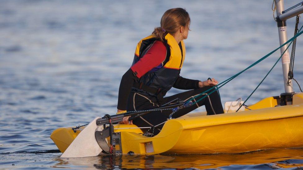 Young woman in boat