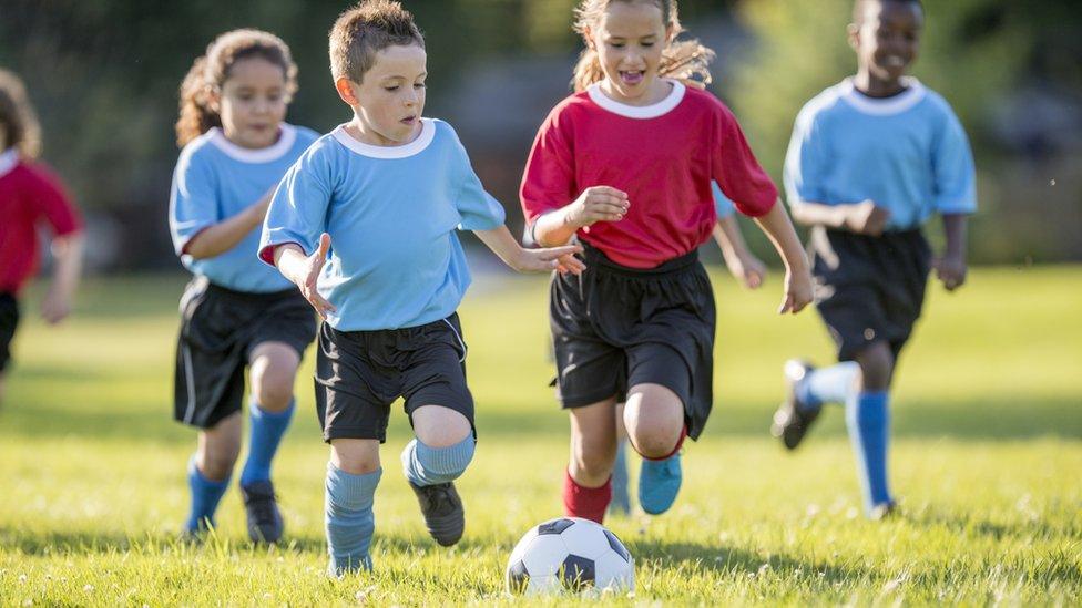 Children playing football