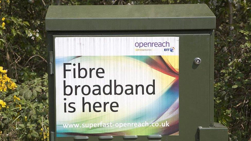 An advert for Openreach pasted onto a junction box