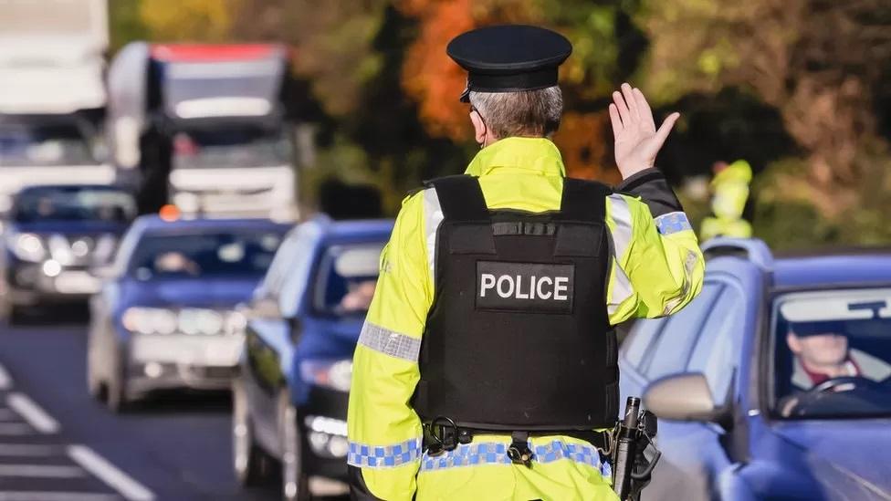 A police officer directing traffic