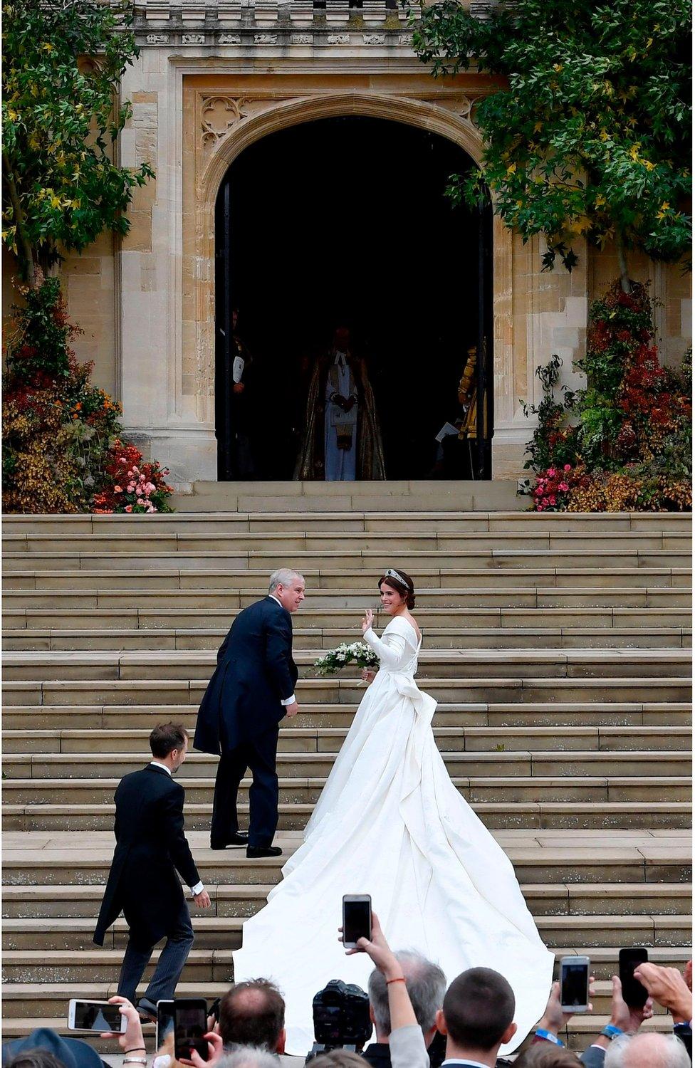 Princess Eugenie of York climbed the steps with her father Prince Andrew, Duke of York