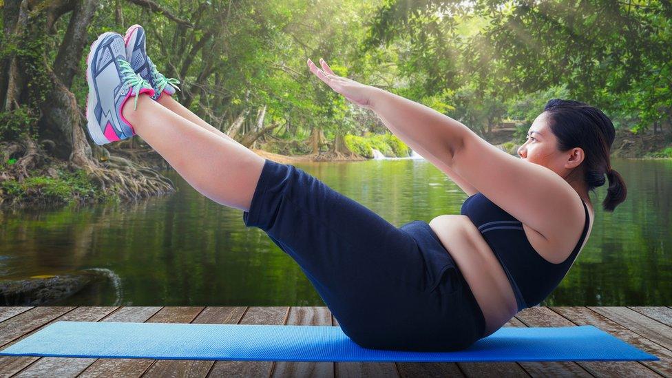 Woman exercising outdoors