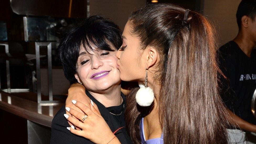 Ariana Grande giving her mum Joan (pictured left) a kiss