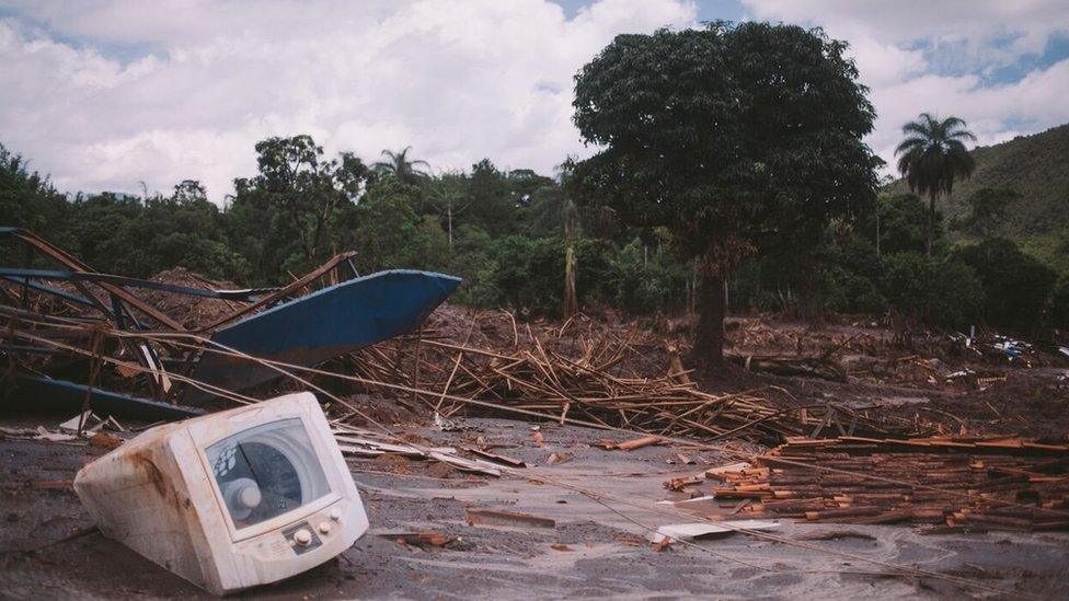 The strength of the flood threw a washing machine far from the home where it had stood