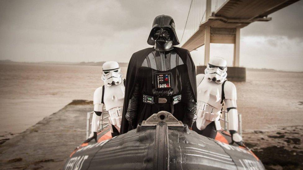 Darth Vader and Stormtroopers on a boat