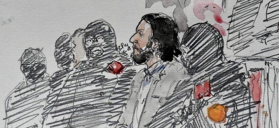 A courtroom sketch showing Salah Abdeslam prior to the opening of his trial