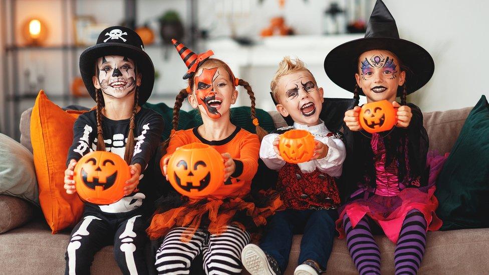 kids in halloween outfits