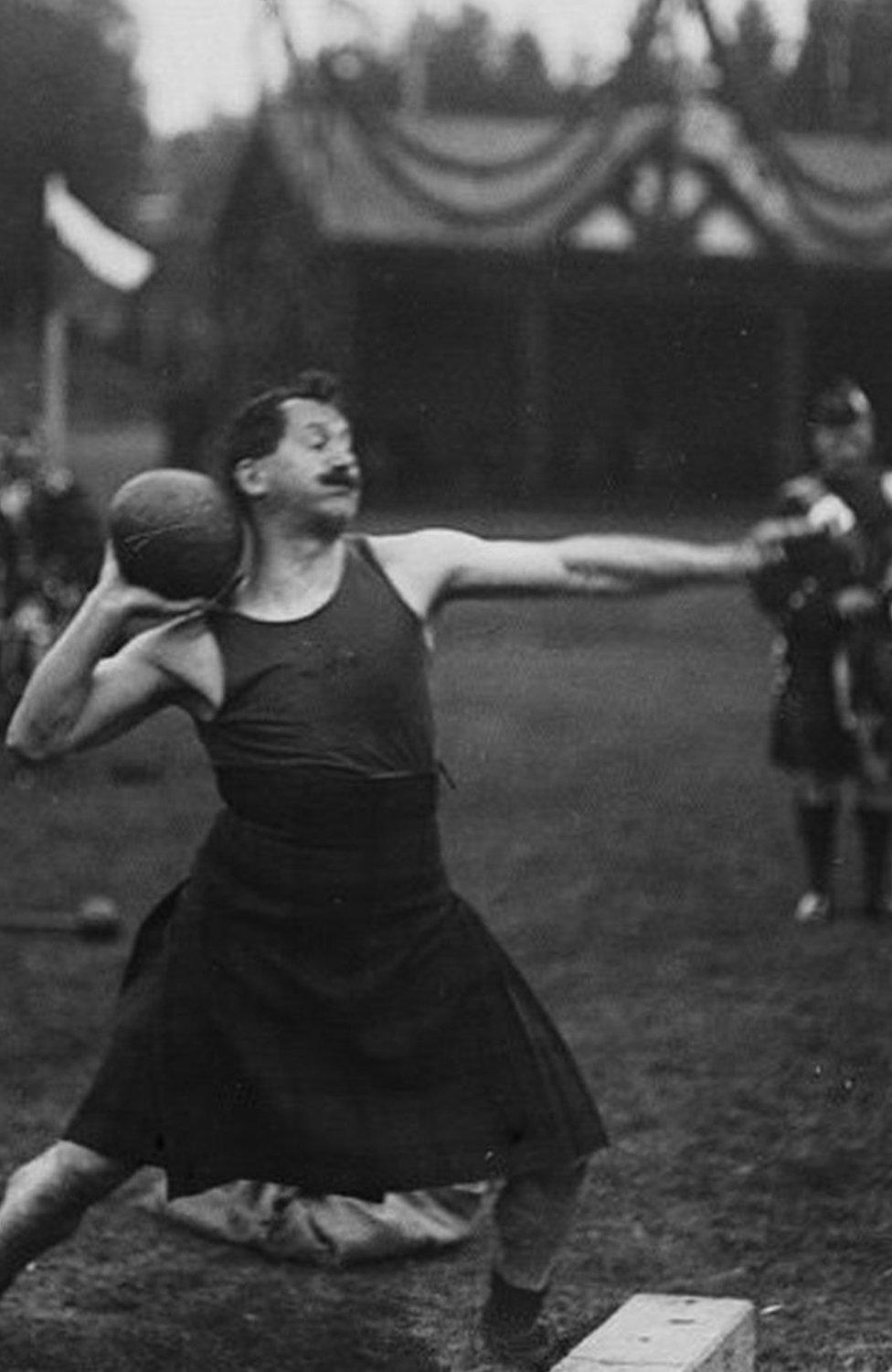 Alexander Finnie putting the heavy stone at Braemar gathering in 1919