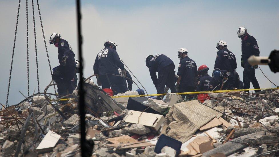 Rescue personnel continues search and rescue operations for survivors of a partially collapsed residential building in Surfside, near Miami Beach, Florida,