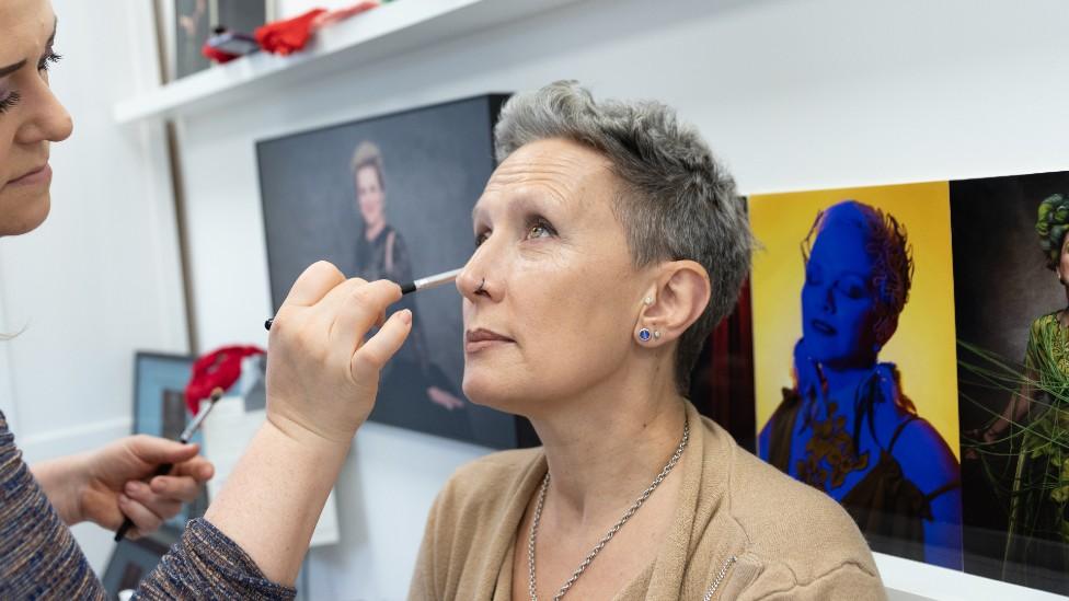 Bev Sharp having make up applied