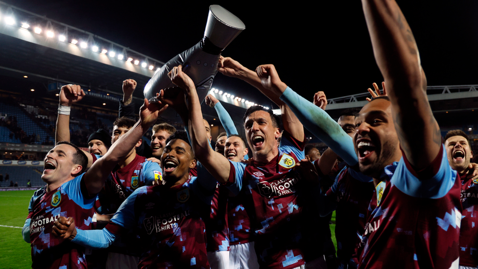 Burnley players celebrating on the pitch