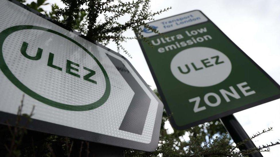 A sign announces the start of the London Ultra Low Emission Zone