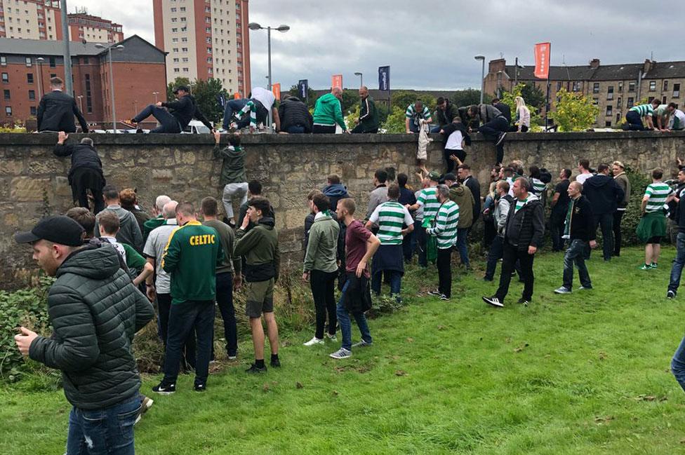 Fans climbing out of the ground