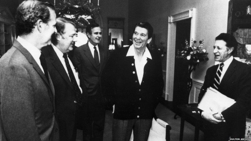 A cabinet meeting in the family quarters of the White House, Washington DC. From left to right: James Baker, Edwin Meese, Vice-President George HW Bush, Reagan and Caspar Weinberger, 1 Apr 1981