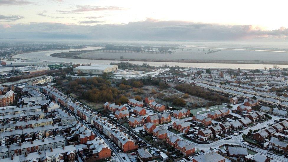 Aerial shot across Goole showing rooftops dusted in show