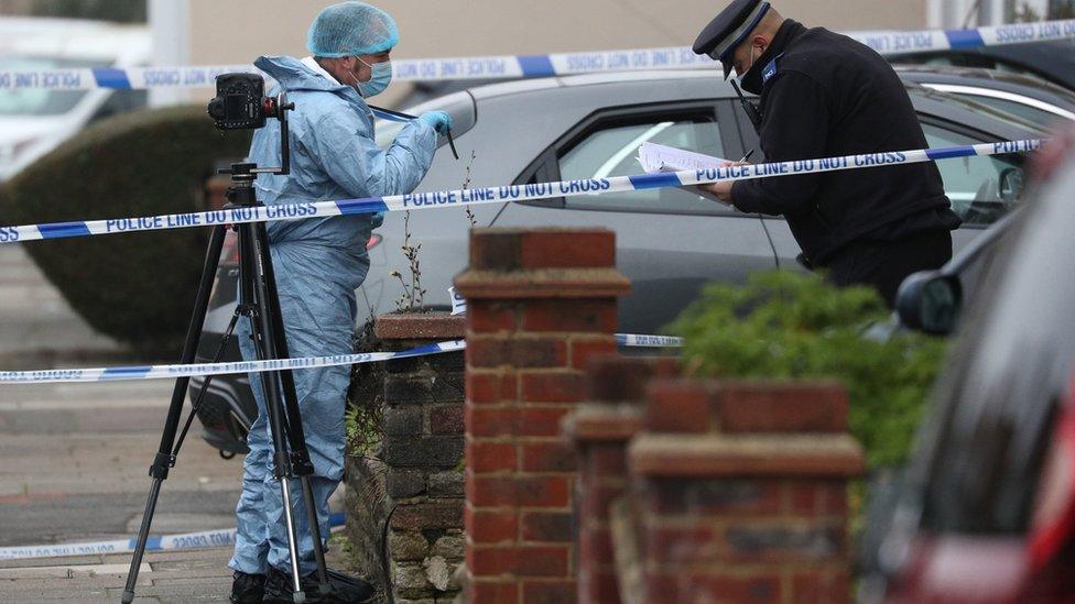 Forensic officers at the scene in Tavistock Gardens