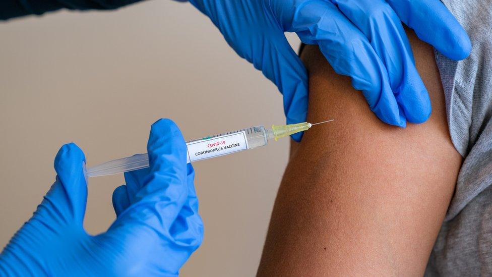 Covid vaccine being administered