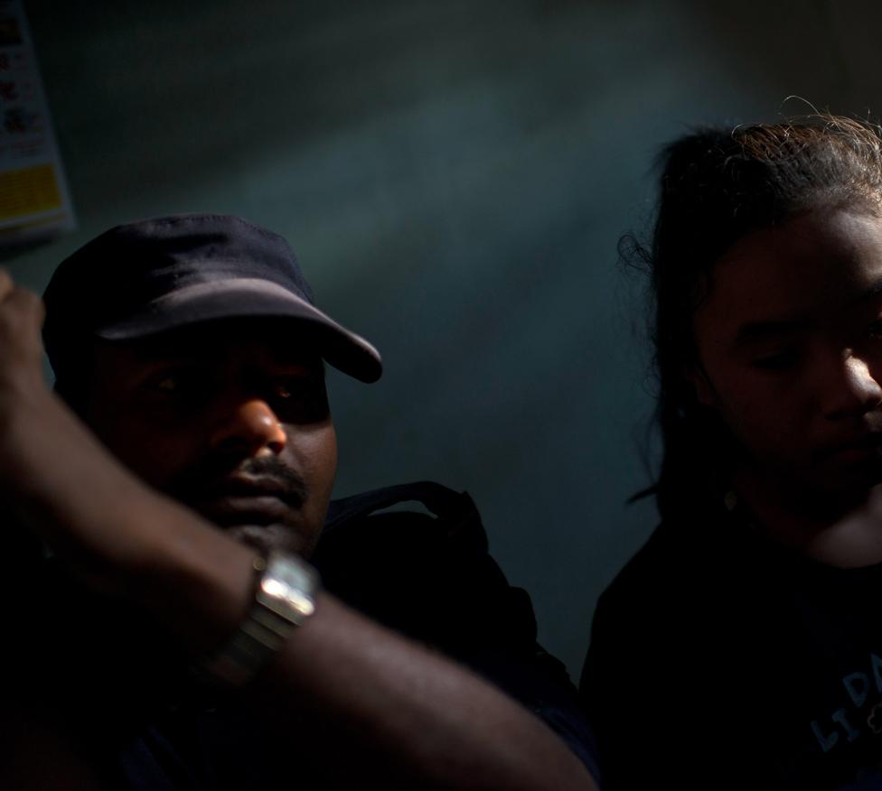 A policeman with a suspected trafficking victim