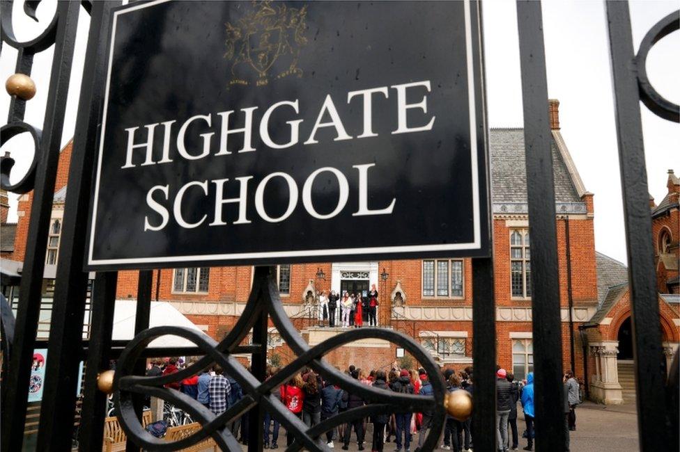 Picture of Highgate School sign with protests in the background