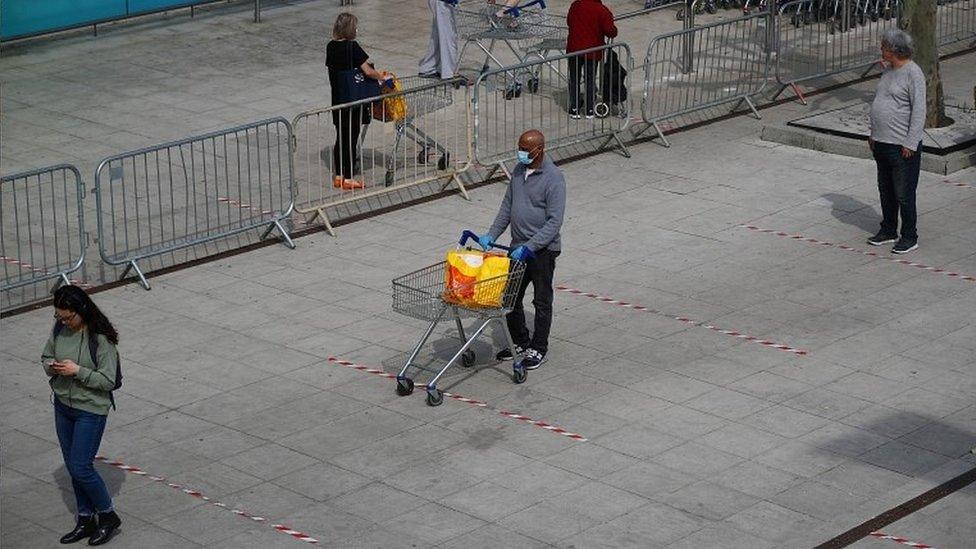 Queue to get into supermarket