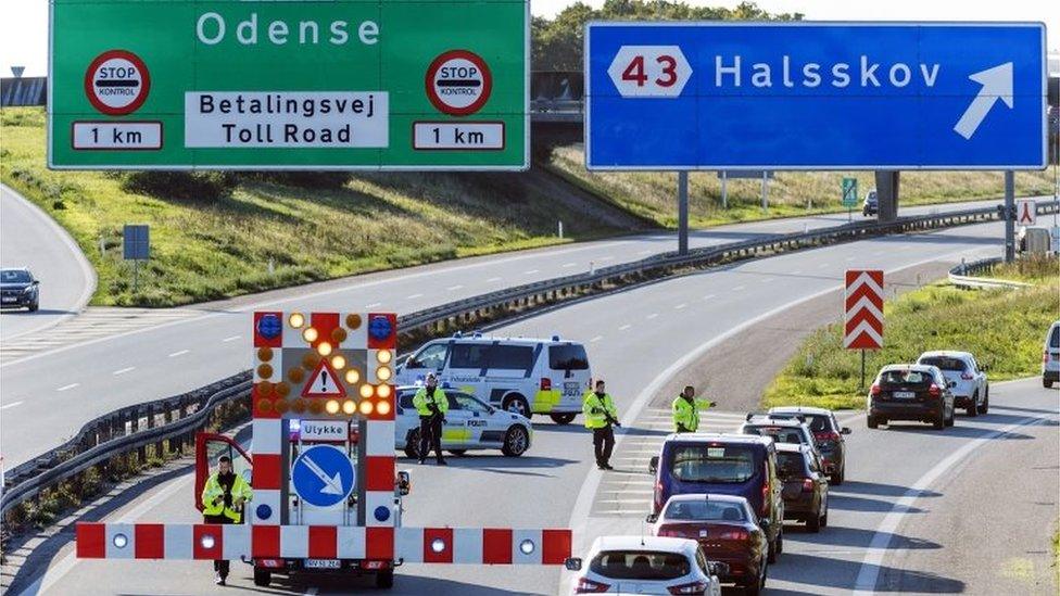 Danish Police set up a barrier before the Great Belt Bridge in Korsoer, Denmark, 28 September 2018