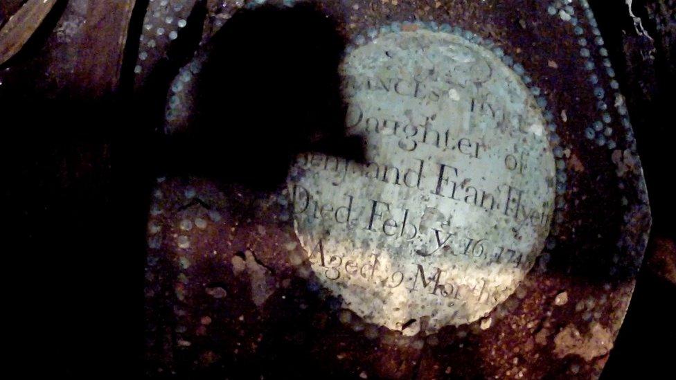 Child's coffin in vault in Gloucester Cathedral