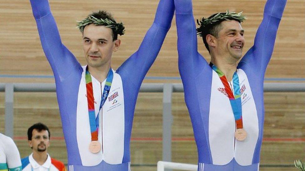 ATHENS, GREECE - SEPTEMBER 19: Ian Sharpe and Paul Hunter take the Bronze Medal after finishing third in the Mens Individual Pursuit Open(B1-3) Finals at the Olympic Velodrome within the Olympic Sports Complex in Athens, Greece. (Photo by Ker Robertson/Getty Images)