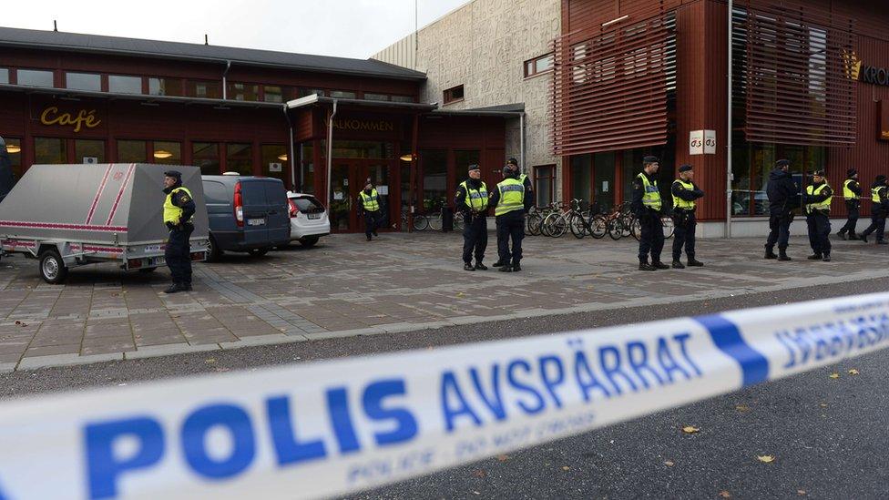 Police work at the scene of a primary and middle school in Trollhattan, southwestern Sweden