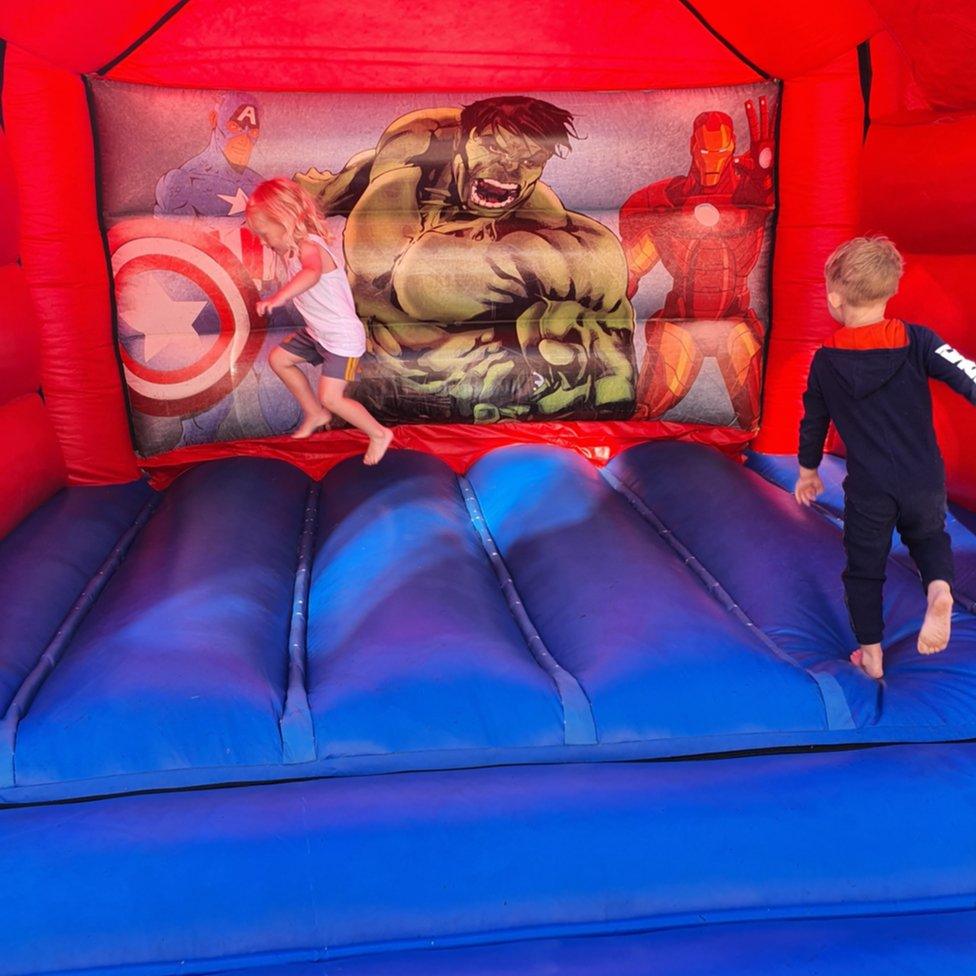 The boys on the bouncy castle.