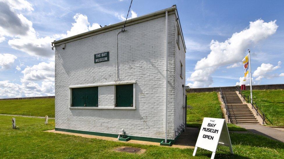 the three-story white-washed building is a 1960s naval monitoring station once used to prevent passing ships setting off magnetic underwater mines