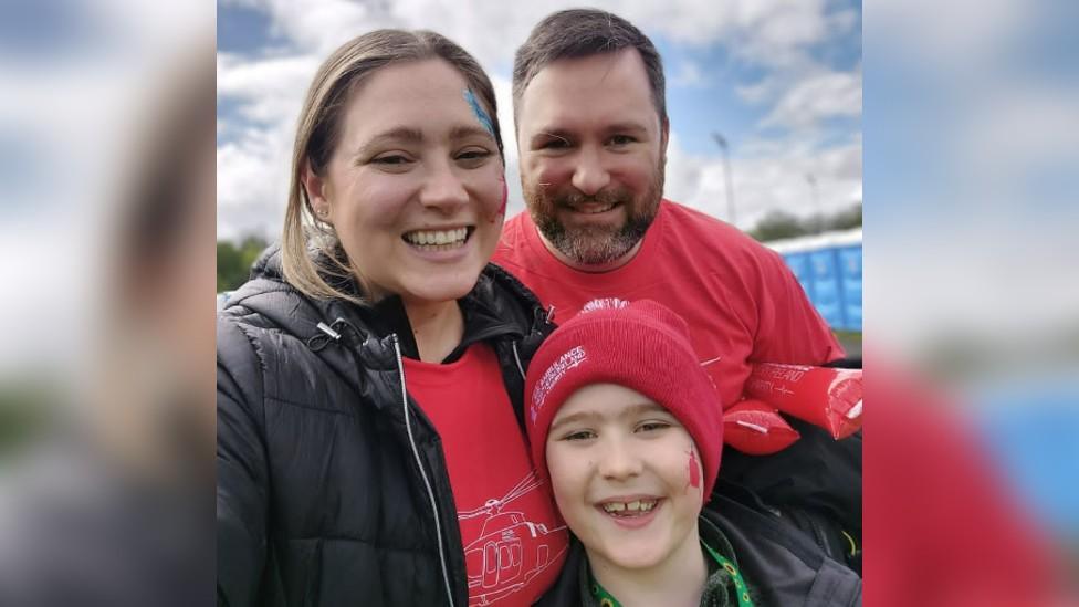 Cillian Rogers with his mum Courtney and dad Daniel