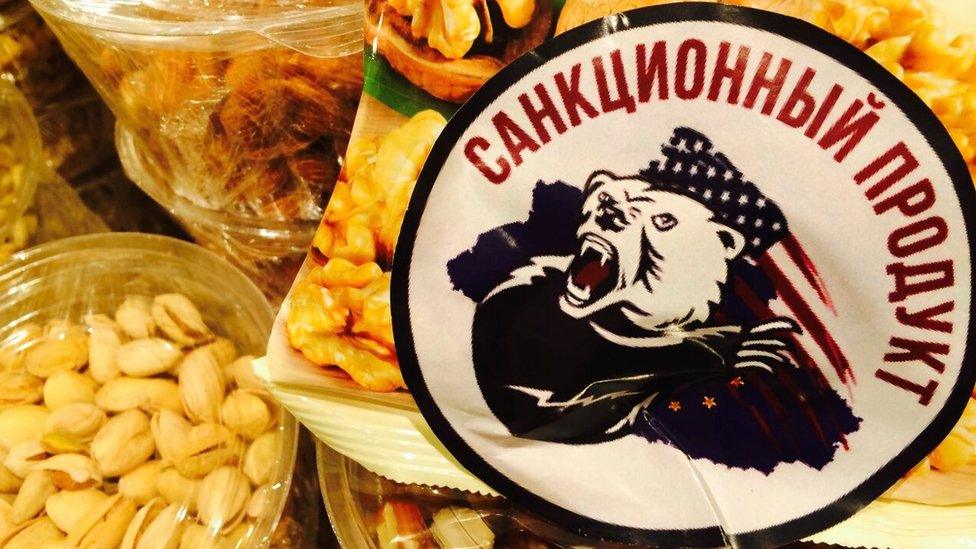 Bear sticker marking food as banned produce