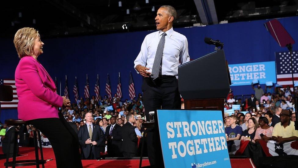 Hillary Clinton and Barack Obama on stage in North Carolina