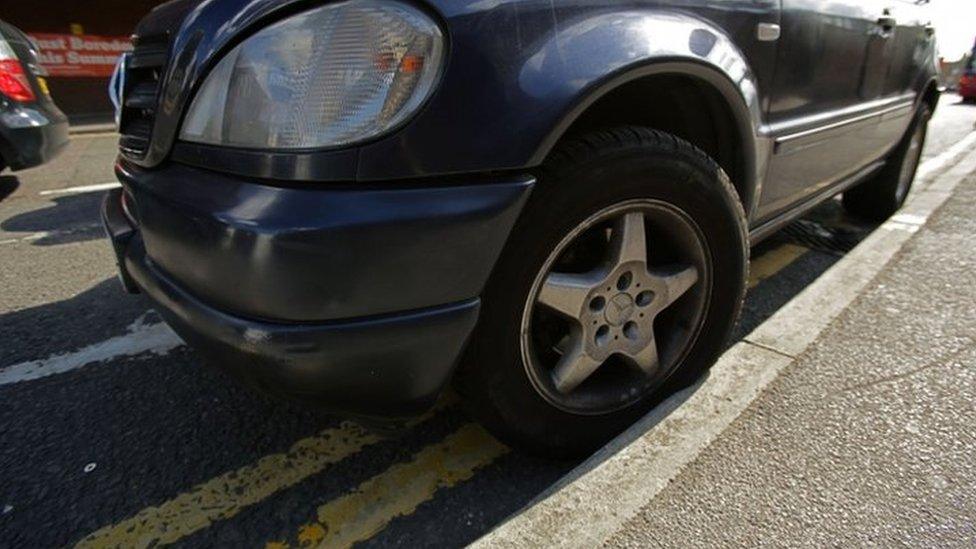 Car on double yellow lines