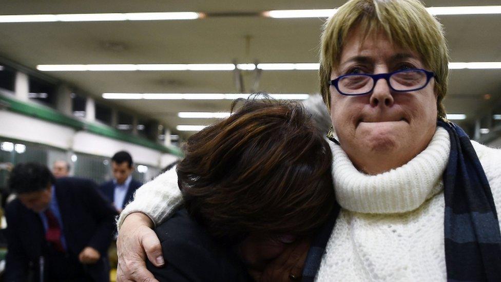 Relatives react to the sentence read by the judges of the Third Court of Rome during the trial of South American military officers and civilians accused of collaborating in the forced disappearances and murder of Italian nationals, in a US-backed regional plan dubbed "Operation Condor ", Rome on January 17, 2017