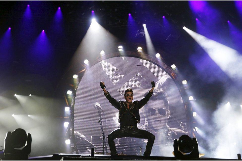 Adam Lambert performs with the band Queen during the Rock in Rio Music Festival in Rio de Janeiro, Brazil, 19 September 2015.