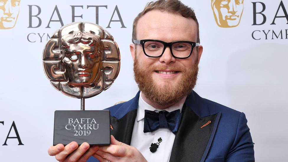 Huw Stephens with his presenter award for Anorac