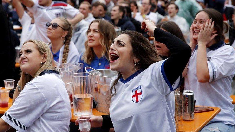 Woman watch football