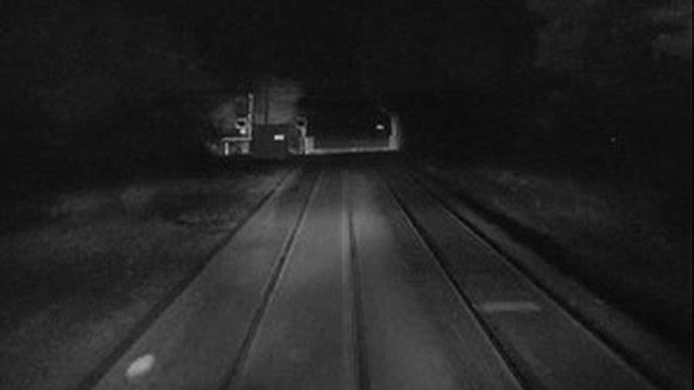 View of Norwich Road level crossing about four seconds before the train reached the crossing