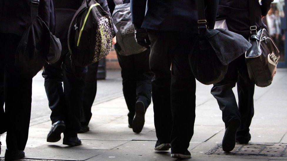 School children walking in uniform