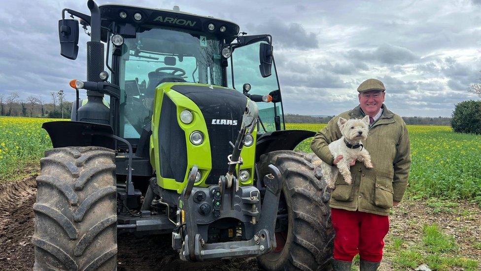 Colin Rayner next to tractor