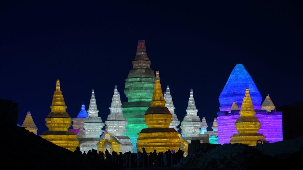 Tourists visit the Harbin International Ice and Snow Sculpture Festival as it officially kicks off, in Harbin, Heilongjiang province, China, January 5, 2017.