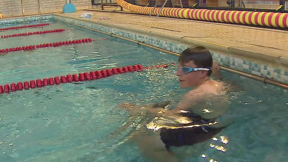 A boy swimming at Calon Tysul