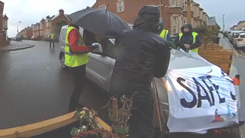 Driver going through protest in Exeter