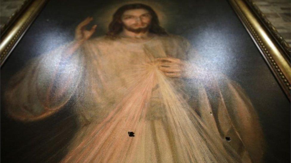 A view of an image of Jesus which was hit by bullets in the Divine Mercy chapel, in Managua, Nicaragua, 15 July 2018.