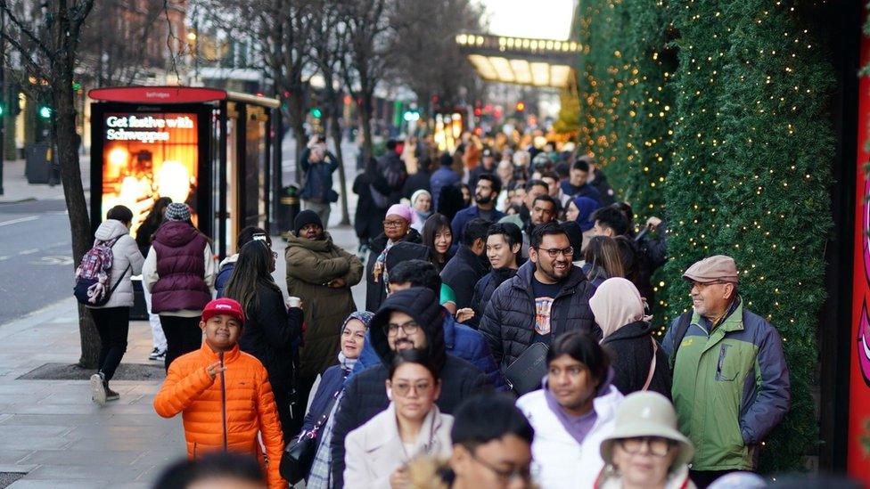 Shoppers queuing outside Selfridges